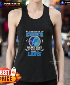 Stylish tank top reads 'I may live in Minnesota, but on game day my heart belongs to Detroit Lions' perfect for fans.