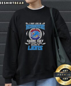 Cozy sweatshirt featuring 'Pretty I May Live In Missouri But On Game Day My Heart Belongs To Detroit Lions' design.