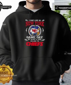 Stylish hoodie featuring 'I may live in New York, but my heart belongs to the Kansas City Chiefs' for game day pride.