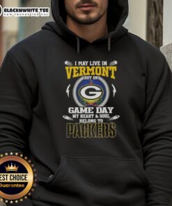 Green Bay Packers hoodie worn by a fan in Vermont, showcasing team pride on game day with vibrant colors and logo.