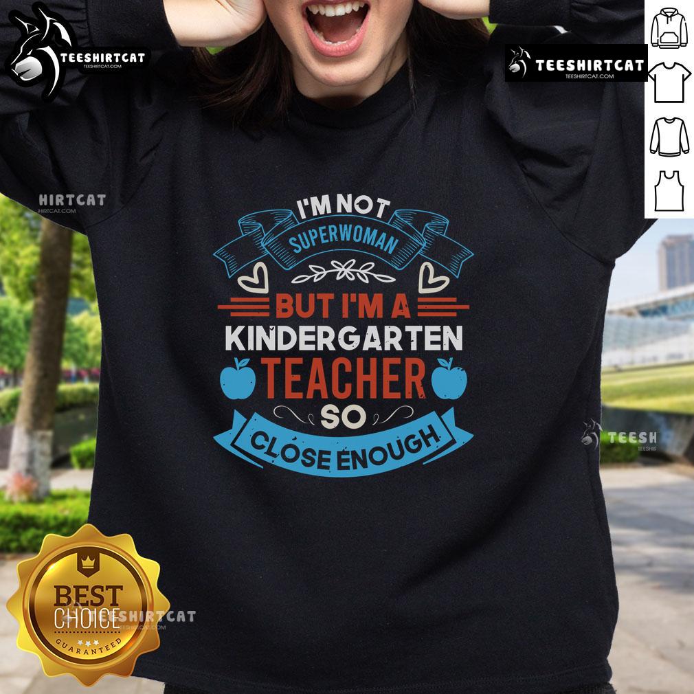 Pretty I'm Not Superwoman But I'm A Kindergarten Teacher So Close Enough Sweatshirt Cozy sweatshirt reading 'I'm Not Superwoman, But I'm A Kindergarten Teacher' perfect for educators and fans of teaching.
