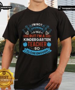 Funny 'I'm Not Superwoman But I'm A Kindergarten Teacher So Close Enough' T-Shirt design for proud educators.