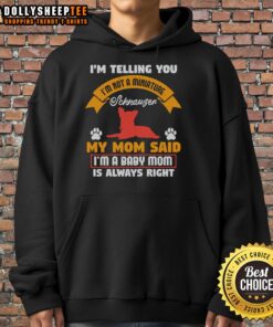 Alt Text: Cute puppy in a hoodie with text 'Im Not A Miniature Schnauzer' showcasing playful personality.