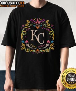 Alt Text: Kansas City Royals Da De Los Muertos celebration T-shirt featuring colorful designs and MLB branding.