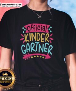 Pretty kindergartner girl smiling on her first day of kindergarten, wearing a cute ladies tee, ready for school adventures.