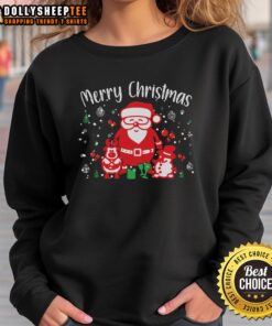 Cute sweatshirt featuring a Merry Christmas design with Santa and a snowman, perfect for festive holiday celebrations.