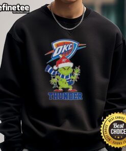 Alt Text: Oklahoma City Thunder Christmas sweatshirt featuring Grinch and Santa hat design, perfect for holiday cheer.