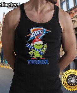 Pretty Oklahoma City Thunder Christmas Grinch Santa Hat holiday tank top worn by a smiling fan at a festive event.
