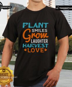Pretty Plant Smiles Grow Laughter Harvest Love T-Shirt featuring a vibrant plant design and cheerful typography.