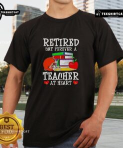 Pretty retired but forever a teacher at heart Cleveland Browns football T-shirt displayed on a neutral background.