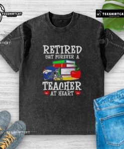 Alt Text: Pretty retired but forever a teacher at heart in a Denver Broncos washed t-shirt, showcasing a casual fan style.