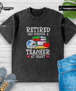 Pretty retired but forever a teacher at heart Detroit Lions football washed t-shirt in a casual setting.