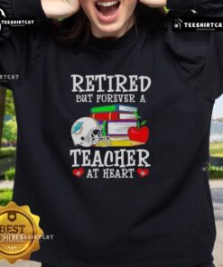 Pretty retired but forever a teacher at heart Miami Dolphins football sweatshirt in vibrant colors, perfect for fans.