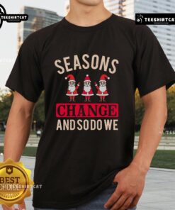 Alt Text: Pretty Seasons Change And So Do We Christmas T-Shirt featuring festive design and vibrant colors for holiday cheer.
