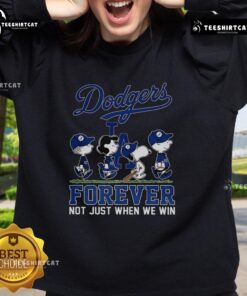 Pretty Snoopy and Friends X Los Angeles Dodgers sweatshirt for baseball lovers, celebrating fandom beyond just winning.