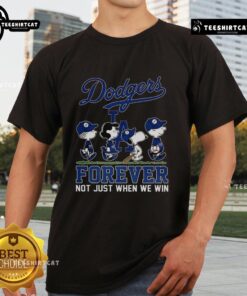 Pretty Snoopy and Friends X Los Angeles Dodgers t-shirt for baseball lovers, celebrating fandom beyond just winning.
