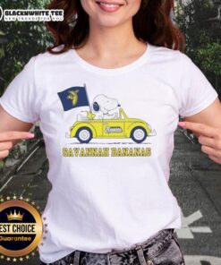 Pretty Snoopy driving a car on a Savannah Bananas ladies tee, showcasing a fun and vibrant design for fans.