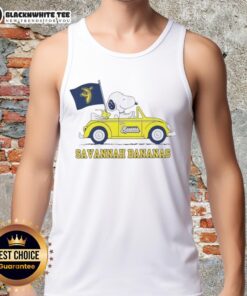 Pretty Snoopy driving a car while wearing a Savannah Bananas tank top, showcasing vibrant colors and playful style.