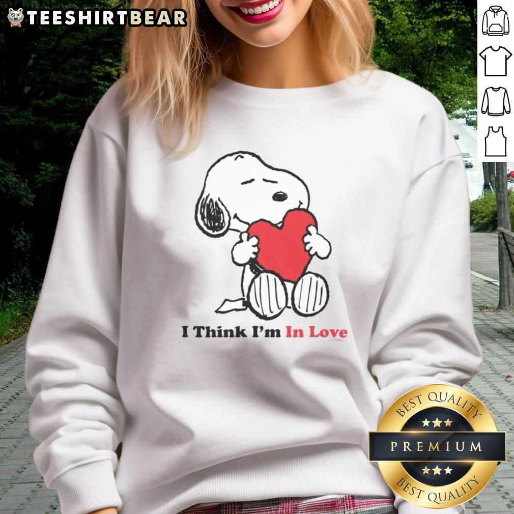 Pretty Snoopy I Think I'M In Love Sweatshirt Pretty Snoopy I Think I'm In Love sweatshirt featuring a cute design of Snoopy with hearts, perfect for casual wear.