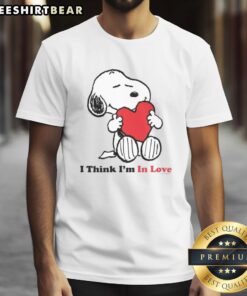 Alt Text: Cute Snoopy I Think I'm In Love T-Shirt featuring a playful design perfect for Peanuts fans and casual wear.