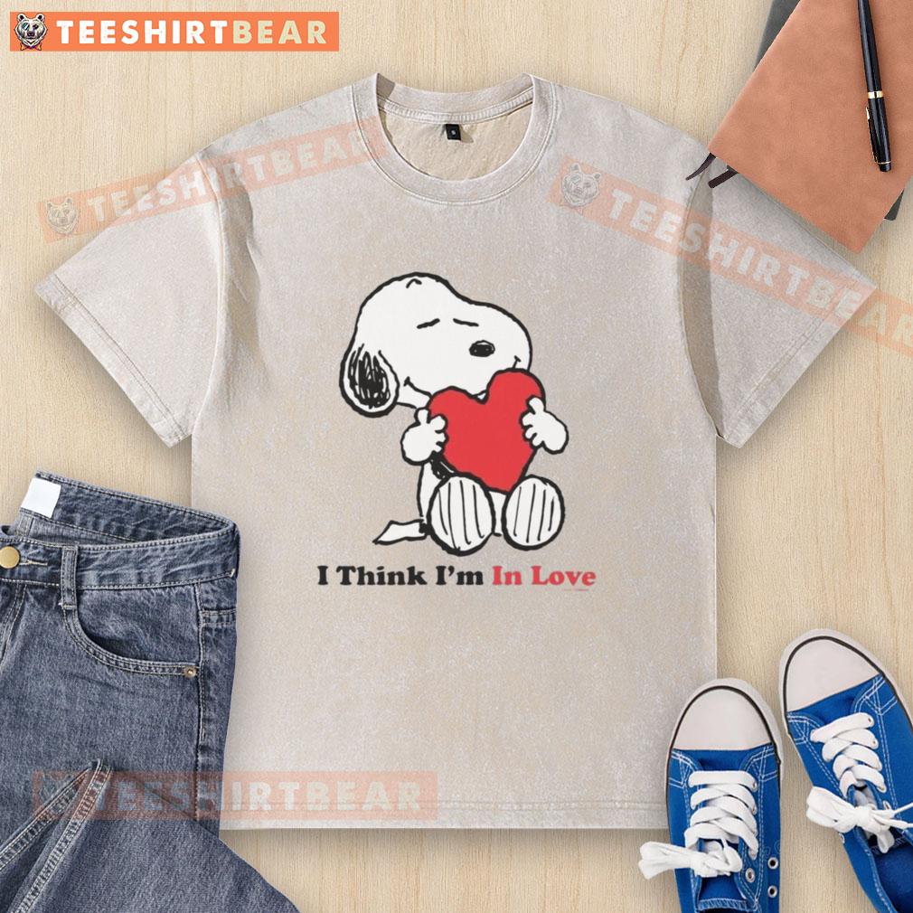 Pretty Snoopy I Think I'M In Love Washed T Shirt Pretty Snoopy 'I Think I'm In Love' washed t-shirt featuring a cute Snoopy graphic on a soft, casual tee.