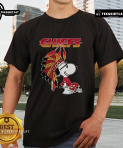 Alt Text: Pretty Snoopy War Bonnets design on a Kansas City Chiefs football helmet T-shirt, perfect for fans.