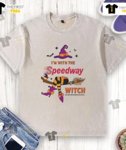 Pretty Speedway Halloween washed t-shirt featuring a witch casting a spell, perfect for festive spooky season attire.