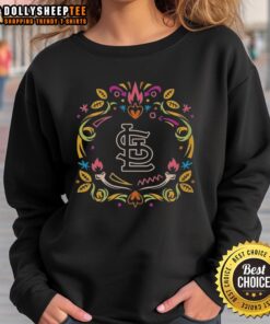 St. Louis Cardinals Dia de los Muertos sweatshirt featuring vibrant colors and festive designs for MLB fans.
