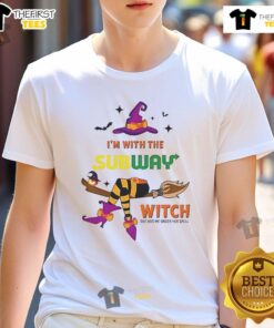 Alt Text: Pretty Subway Halloween T-Shirt featuring 'I'm With The Witch, She Has Me Under Her Spell' design for festive fun.