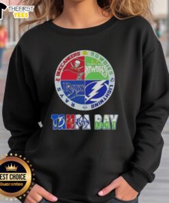 Cozy sweatshirt featuring logos of Tampa Bay sports teams: Buccaneers, Rowdies, Lightning, and Rays.