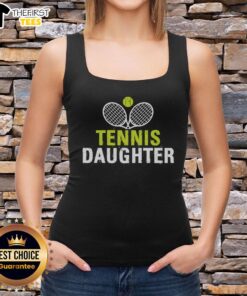 Pretty tennis daughter wearing a stylish tank top, ready for a match on the court with a smile and tennis racquet.