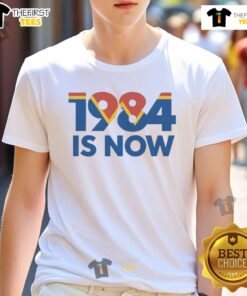 Top 1984 Is Now T-Shirt featuring a retro design and bold typography for fans of the classic novel and vintage style.