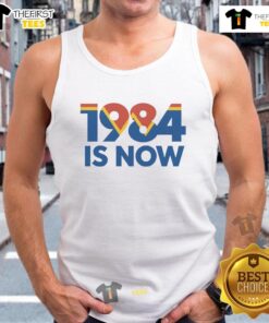 Stylish 'Top 1984 Is Now' tank top featuring bold graphics, perfect for casual summer wear and trendy outfits.