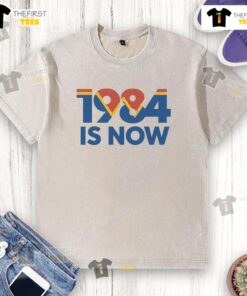 Top 1984 Is Now Washed T-Shirt featuring a vintage design, perfect for casual wear and retro fashion enthusiasts.