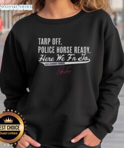 Alt Text: George Springer in a Toronto Blue Jays sweatshirt celebrates as a police horse stands nearby during 2025 Division Champs event.