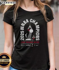 Alt Text: 2025 WNBA Champions Las Vegas Aces trophy on display with ladies tee, celebrating victory in women's basketball.