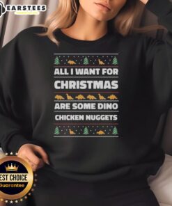 Ugly Christmas sweatshirt featuring 'All I Want For Christmas Are Some Dino Chicken Nuggets' design in festive colors.