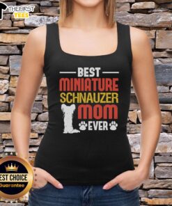 Miniature Schnauzer mom wearing a fun tank top that says 'Top Best Miniature Schnauzer Mom Ever' in vibrant colors.