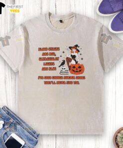 Top blood stains are red on a washed t-shirt, highlighting the contrast under ultraviolet lights that are blue.