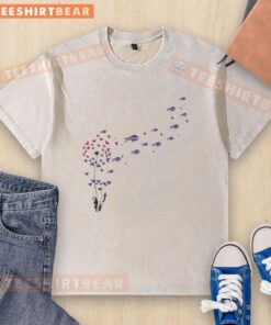 Top view of a washed t-shirt featuring the Buffalo Bills football logo with a dandelion flower design.