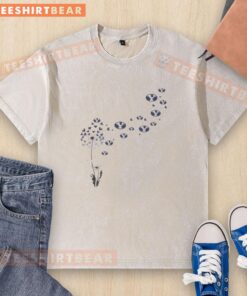 Top view of a washed t-shirt featuring the BYU Cougars football logo and a dandelion flower design.