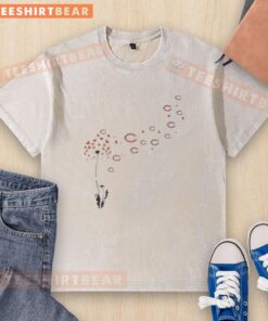 Top view of a dandelion flower with Chicago Bears football logo on a washed t-shirt, perfect for fans and casual wear.