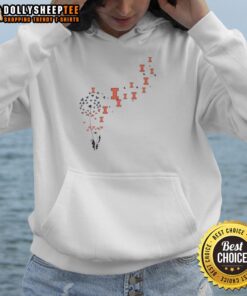 Top view of a dandelion flower with Illinois Fighting Illini football logo hoodie in vibrant colors.