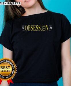 Alt Text: Deandre Ayton wearing the Obsess18n LA 2025-2026 Ladies Tee, showcasing stylish sportswear for fans.