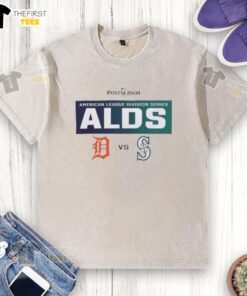 Alt Text: 2025 MLB ALDS matchup t-shirt featuring Top Detroit Tigers vs Seattle Mariners design in a washed style.