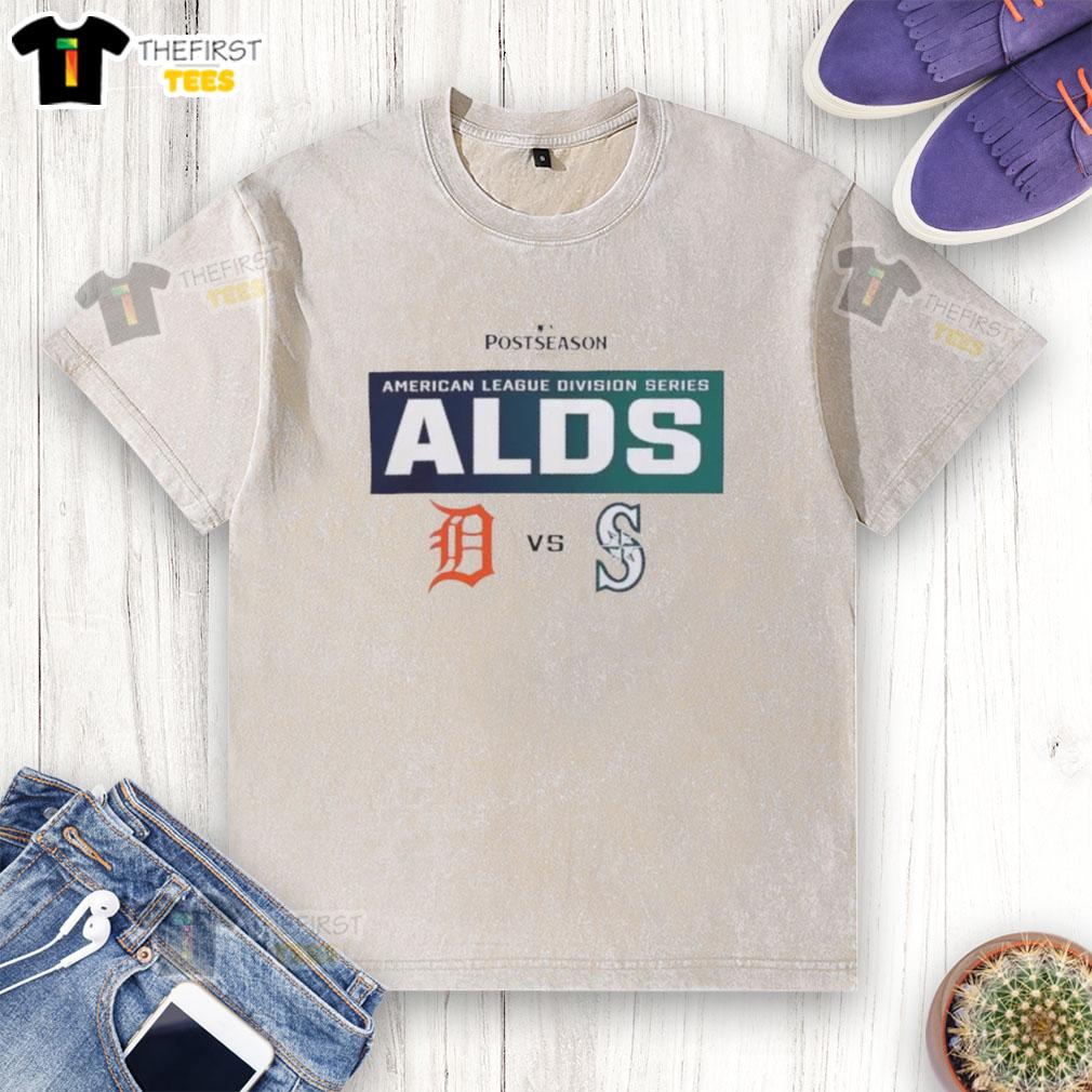 top-detroit-tigers-vs-seattle-mariners-2025-postseason-mlb-alds-matchup-washed-t-shirt Alt Text: 2025 MLB ALDS matchup t-shirt featuring Top Detroit Tigers vs Seattle Mariners design in a washed style.