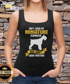 Miniature Schnauzer wearing a tank top with 'Don't Judge My Miniature Schnauzer' design, perfect for dog lovers.