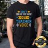 Top Don't Make Me Use My Teacher Voice T-Shirt design featuring bold text, perfect for educators and teaching enthusiasts.