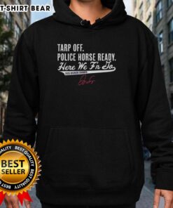 George Springer celebrates Toronto Blue Jays 2025 Division Champs in hoodie, with tarp off and police horse ready.