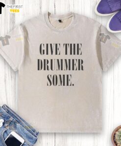 Top Give The Drummer Some washed t-shirt featuring a vibrant graphic design, perfect for music lovers and casual wear.